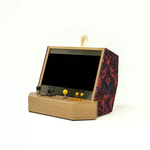 Wooden arcade cabinet with pink and red fabric