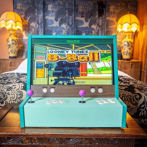 Green Minato arcade cabinet with custom prints