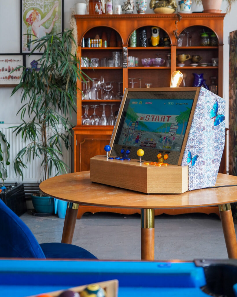 Out Run arcade game on wooden luxury arcade cabinet